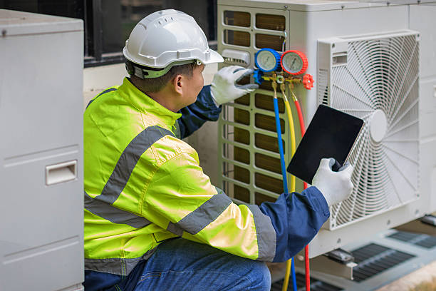 Professional Heat Pump Repair technician working in Carolina Beach, NC